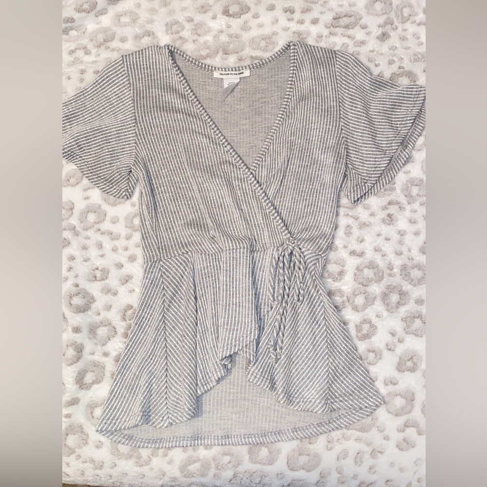 Caution to the wind top